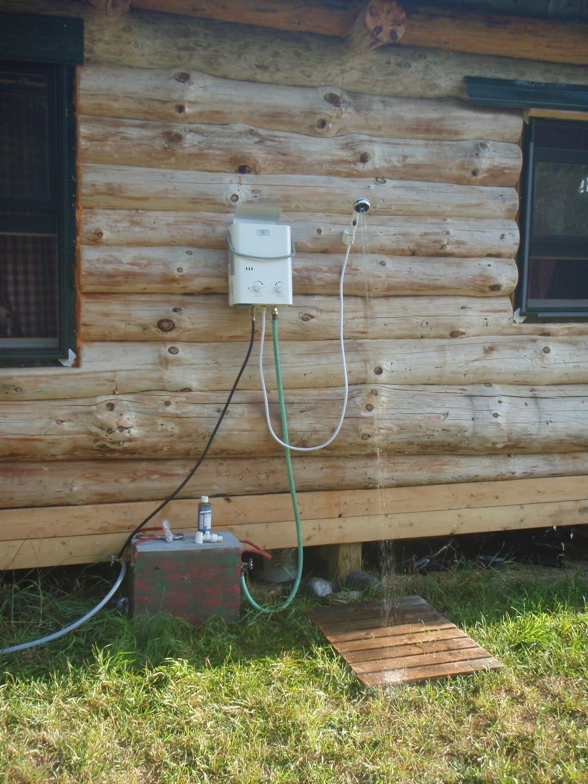 Realistic campsite scene showing a shower setup