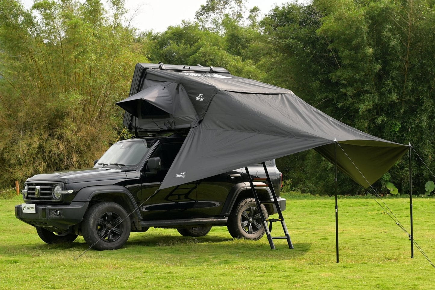 Topoak Vision rooftop tent set up in winter campsite – all-season survival shelter