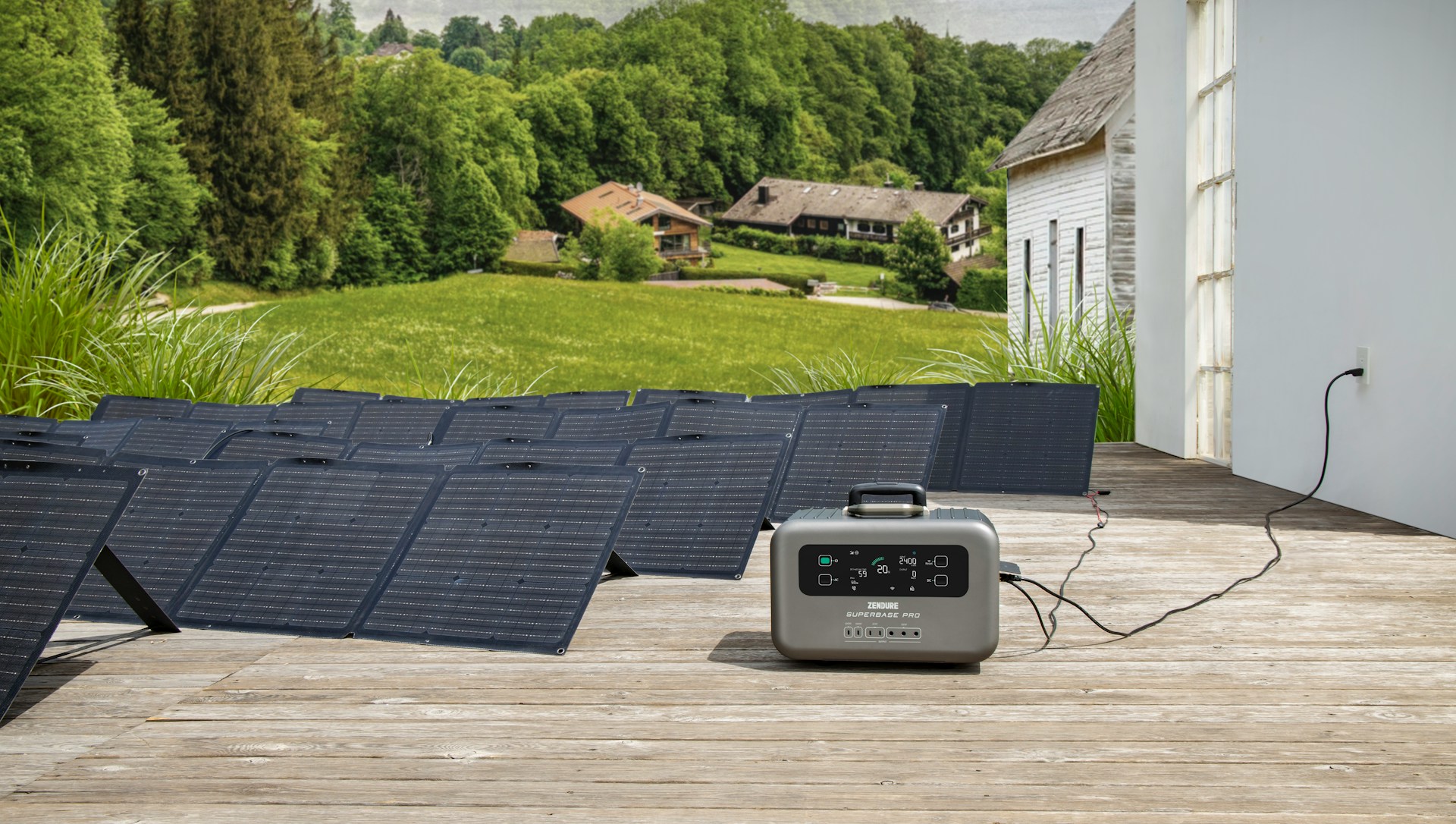 portable solar generator connected to foldable solar panels providing emergency backup power for a home during a blackout